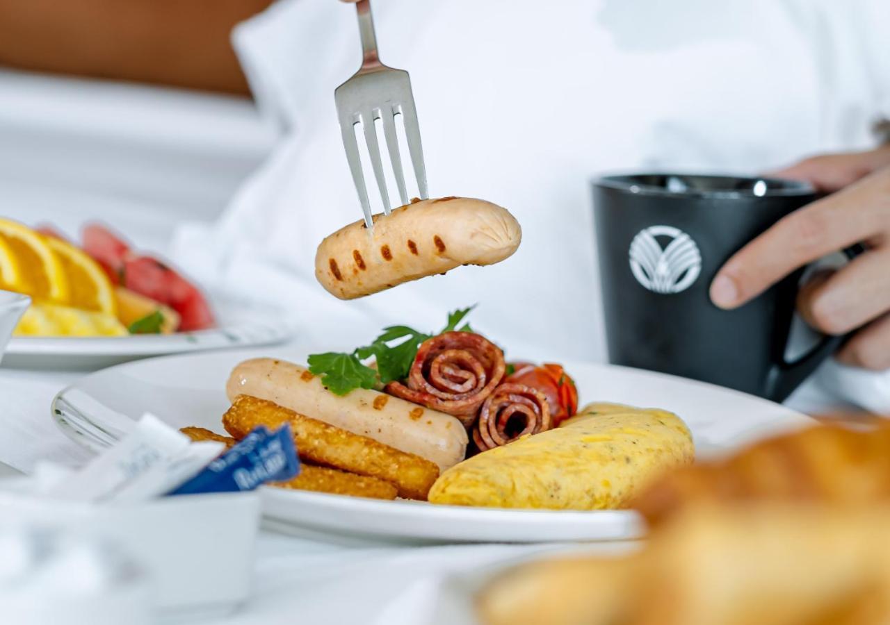 City Centre Rotana Доха Экстерьер фото A breakfast at the hotel