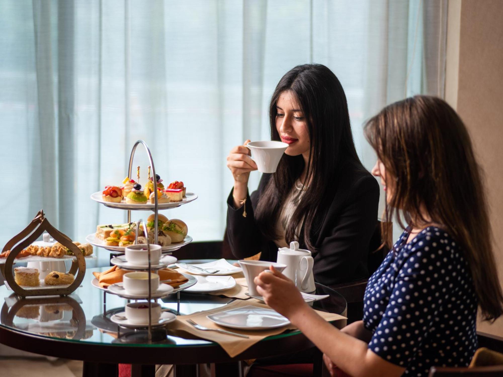 City Centre Rotana Доха Экстерьер фото Afternoon tea