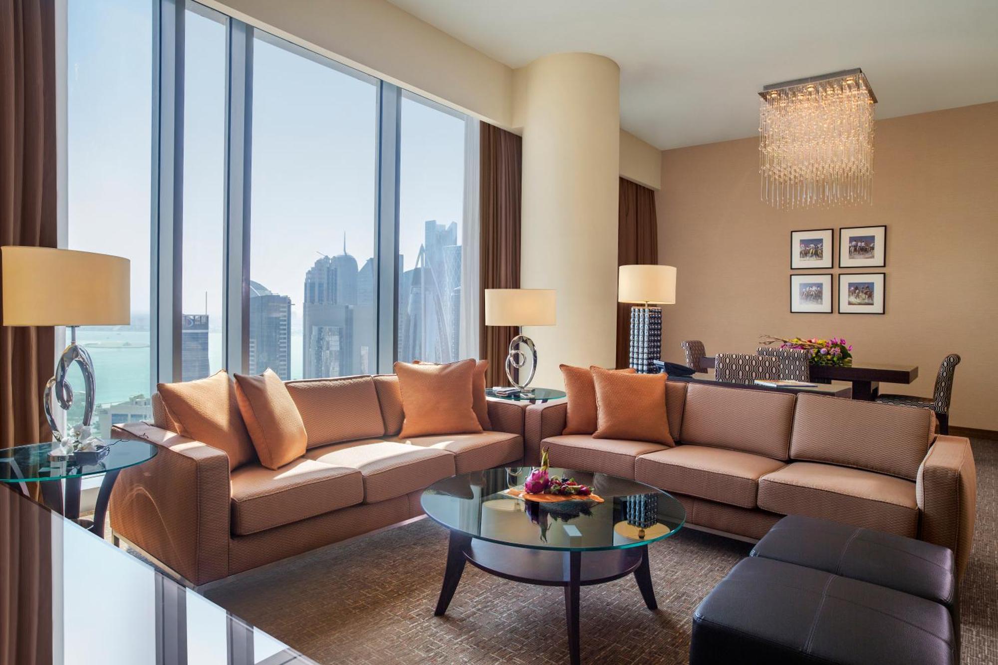 City Centre Rotana Доха Экстерьер фото A living room in a suite at the Ritz-Carlton, DIFC